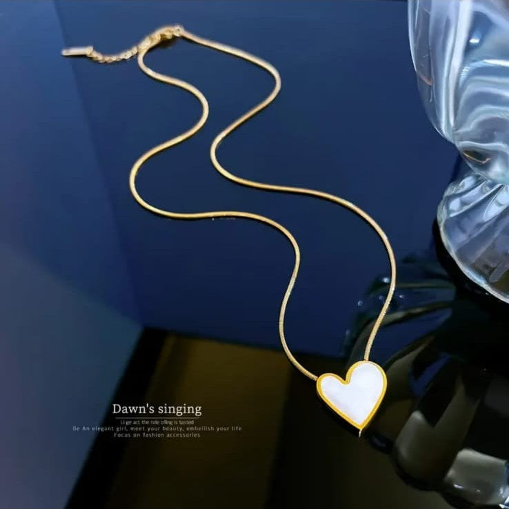 white heart pendant