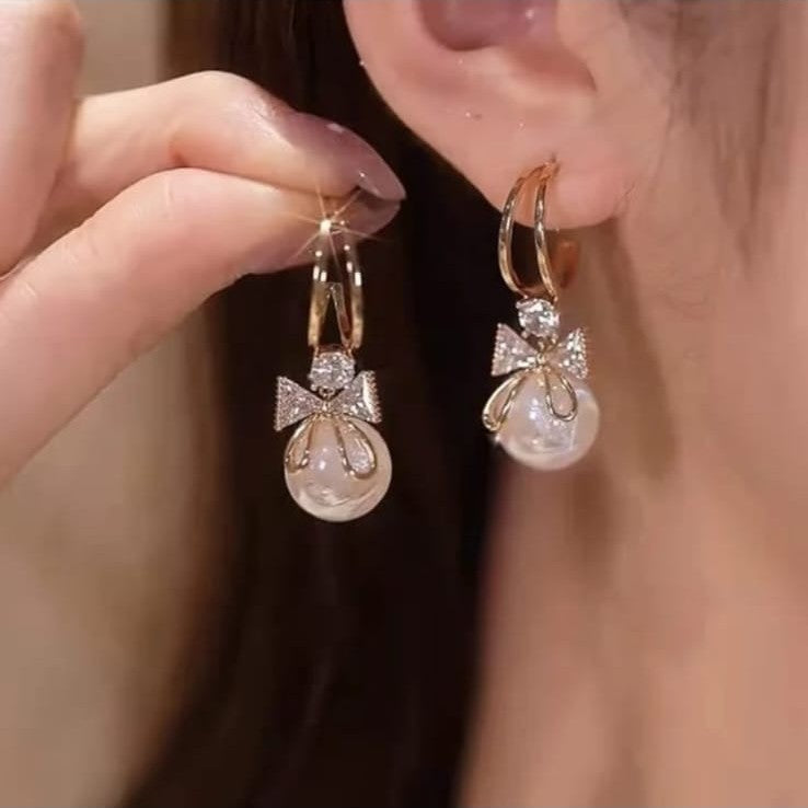 Pearl Drops With Crystal Bow Earring