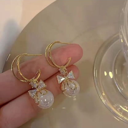 Pearl Drops With Crystal Bow Earring