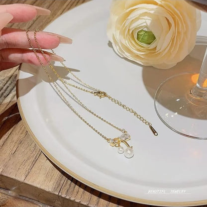gold plated bow diamond pendant